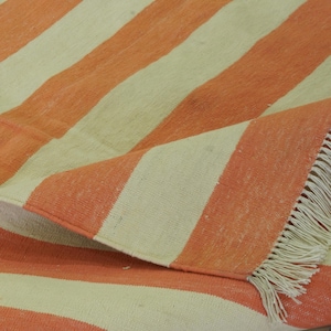 Reversible Handmade Cotton Rug, Handwoven Orange Striped Vegetable Dyed Indian Dhurrie, Flatweave Washable Sustainable Rug For Bedroom Decor