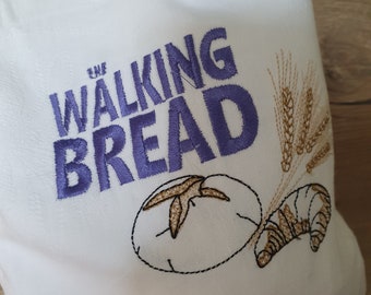 Brotbeutel "The Walking Bread" nachhaltig und wiederverwendbar aus Omas Stoffen mit schöner Stickerei.