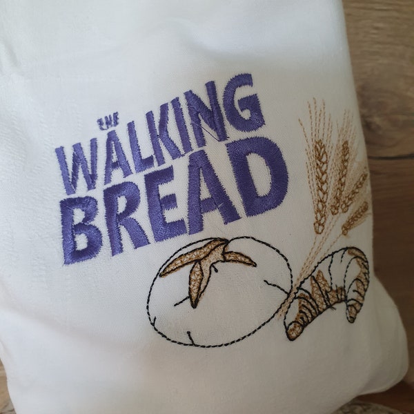 Brotbeutel "The Walking Bread" nachhaltig und wiederverwendbar aus Omas Stoffen mit schöner Stickerei.