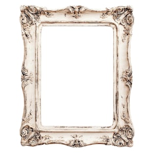 May include: A white ornate picture frame with a distressed finish. The frame has a decorative, carved design around the edges.