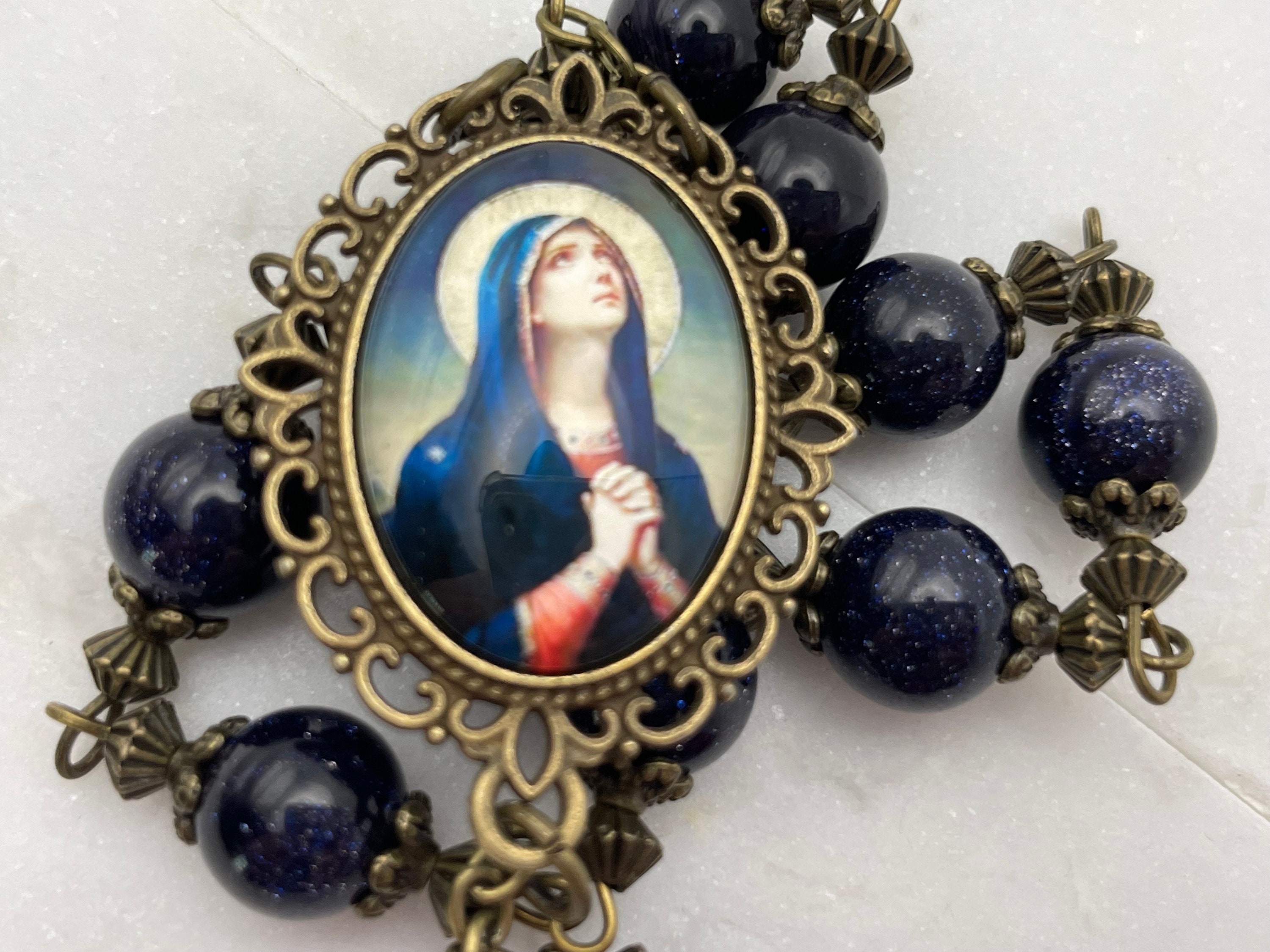 One Decade Ruby Our Lady of 7 Sorrows Marian, AAA Ruby + Blue Sandstone Gemstone Tenner ...