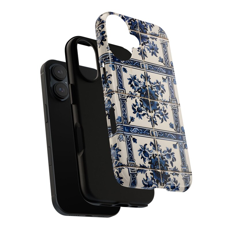 May include: A black smartphone with a protective case featuring a blue and white floral tile design. The case is detached, showcasing the phone's camera and screen. The design resembles traditional Portuguese azulejo tiles.