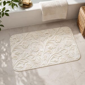 Crèmekleurig badkleed met reliëf en bloemenmotief, antislip badmat van traagschuim