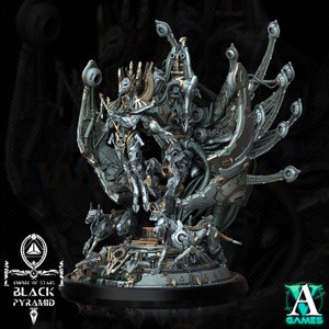 May include: A detailed miniature of a metallic, multi-limbed creature with a humanoid figure at its center. The creature is perched on a circular base with intricate details. The miniature is painted in shades of silver, gold, and black. The text "Empire of Stars Black Pyramid" is visible on the base.