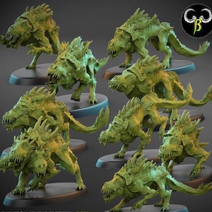May include: A set of eight green, detailed, miniature, plastic, fantasy creatures. The creatures are in various poses and have sharp teeth and claws.