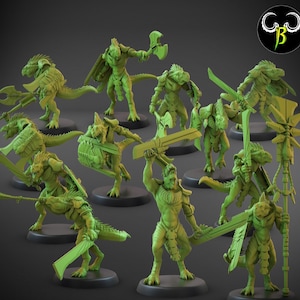 May include: A set of 12 green plastic miniature figurines of lizard-like creatures, some holding weapons, others with shields. The figures are posed in various action stances and are set on black circular bases.