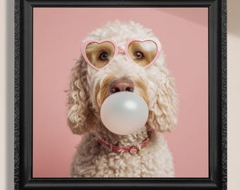 May include: A white dog wearing pink heart-shaped sunglasses blows a bubble with a large bubblegum bubble. The dog is against a pink background.