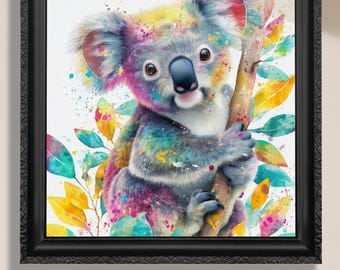May include: A framed watercolour print of a koala bear with colourful fur, clinging to a tree branch. The artwork features a vibrant palette of blues, yellows, pinks, and greens. The text "Canvas or Paper Print" is at the bottom.