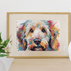 May include: A framed watercolor painting of a dog's face with colorful splashes of paint in the background.