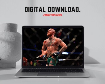 May include: A laptop displays a digital download image of a mixed martial arts fighter in a fighting stance. The fighter is shirtless, with tattoos, and wearing green and black shorts. The text "DIGITAL DOWNLOAD." and "FIGHTPOSTERS" are visible.
