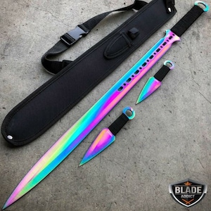 May include: A rainbow-colored sword with a black sheath and two matching throwing knives. The sword has a black handle and a silver blade with a rainbow iridescent finish. The throwing knives are also rainbow-colored and have black handles.