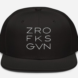 May include: A black and white baseball cap with the text "ZRO FKS GVN" embroidered on the front.
