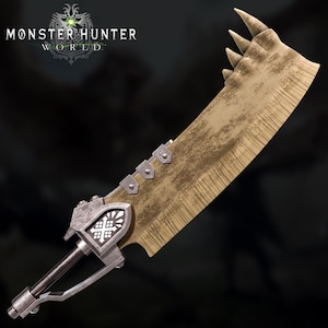 May include: A large, tan-colored weapon with a jagged edge and a silver handle. The blade has a textured appearance, and the handle features a decorative emblem. The text "MONSTER HUNTER WORLD" is visible in the upper left corner.