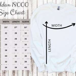May include: Gildan 18000 Size Chart for sweatshirts. The chart shows the width, length, and sleeve length in inches for sizes S through 5XL.