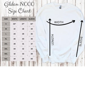 May include: A white Gildan 18000 sweatshirt with a size chart. The chart shows measurements for width, length, and sleeve length in inches for sizes S through 5XL. Arrows indicate where measurements are taken on the sweatshirt.