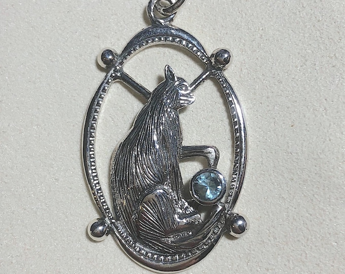 Vintage Sterling Silver Cat sitting on a window, with blue crystal, animal, pet jewelry.