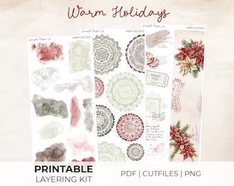 May include: Printable layering kit with a holiday theme. The kit includes watercolor-style blotches in shades of red, gray, and beige, along with mandala designs and poinsettia illustrations. The text "Warm Holidays" and "Printable Layering Kit" are visible.