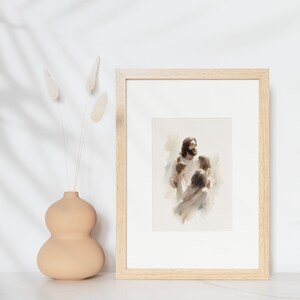 May include: A framed watercolor painting depicting a man with a beard and long hair, holding two children in his arms. The man is wearing a white robe and the children are wearing white clothing. The painting is set against a light brown background.