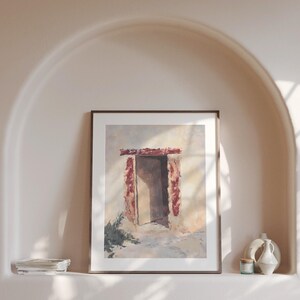 Pode incluir: Uma pintura emoldurada de uma porta com uma moldura vermelho-marrom e uma porta branca. A porta est&aacute; situada contra uma parede branca com um fundo marrom claro. A pintura est&aacute; em uma moldura marrom simples.