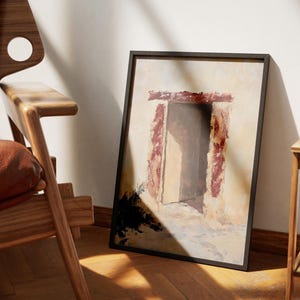 Pode incluir: Uma pintura emoldurada de uma porta com um arco vermelho e branco. A porta est&aacute; aberta e o fundo &eacute; de cor bege claro.
