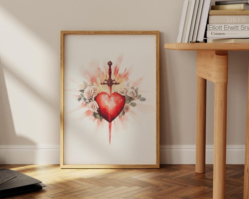 Pode incluir: Uma pintura em aquarela de um cora&ccedil;&atilde;o vermelho atravessado por uma espada, rodeado de rosas brancas e uma explos&atilde;o de luz.