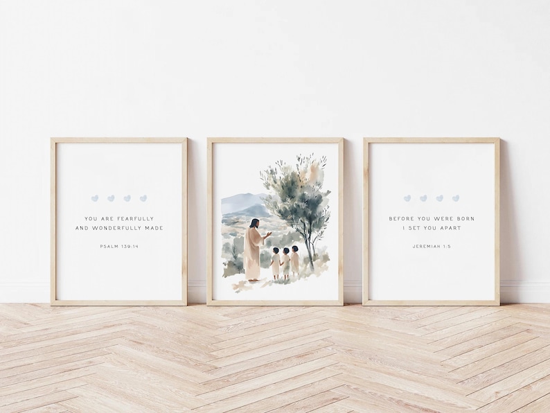 May include: Three framed prints with watercolor illustrations and inspirational quotes. The center print features a painting of Jesus with two children. The left print says "You are fearfully and wonderfully made, Psalm 139:14". The right print says "Before you were born I set you apart, Jeremiah 1:5".