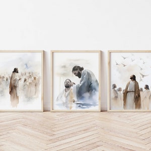 May include: Three watercolour paintings depicting scenes from the life of Jesus. The first painting shows Jesus speaking to a crowd of people. The second painting shows Jesus baptising a man in a river. The third painting shows Jesus standing with his disciples, looking up at the sky.