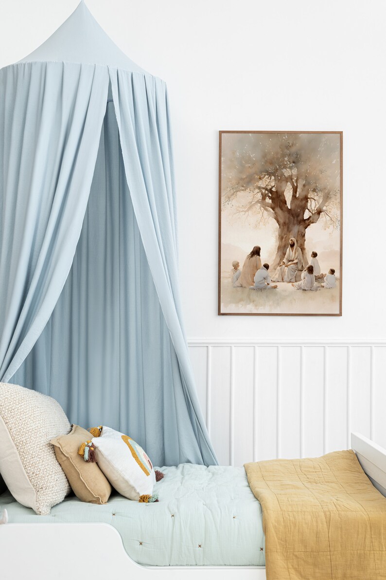 May include: A light blue canopy bed with a white and beige patterned quilt and pillows. A framed watercolor painting of Jesus teaching under a tree hangs on the wall.