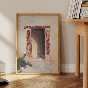 Pode incluir: Uma pintura emoldurada de uma porta com um arco de padr&atilde;o vermelho e branco. A porta est&aacute; aberta e leva a um quarto branco com uma fonte de luz que vem do lado esquerdo da imagem.
