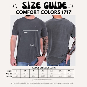 May include: Size guide for Comfort Colors 1717 t-shirts. The image shows a gray t-shirt with measurements in inches. The width ranges from 46.36 cm to 75.57 cm, and the length ranges from 67.56 cm to 85.09 cm. Adult unisex sizing is provided.