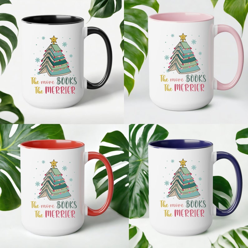May include: Four different color mugs with a white background and a colored rim. Each mug features a Christmas tree made of stacked books with the text "The more BOOKS The MERRIER" printed below.