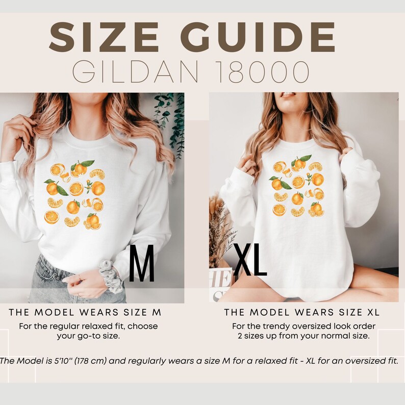 May include: Size guide for Gildan 18000 sweatshirts. A white sweatshirt with an orange citrus fruit print is shown in size M and XL. The model is 5'10" (178 cm) and wears a size M for a relaxed fit and XL for an oversized fit.