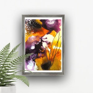 May include: Abstract painting in a gray frame with purple, orange, and yellow colors. The painting has a textured look and is framed in a simple gray frame.