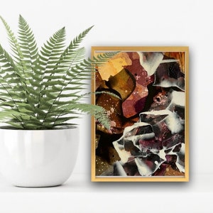 May include: Abstract painting in a gold frame with shades of brown, white, and purple. The painting has a textured, layered look.