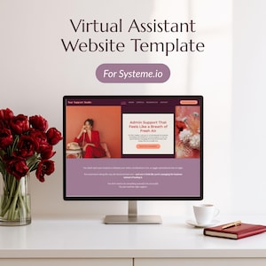 May include: A computer monitor displaying a Virtual Assistant Website Template for Systeme.io. The screen shows a website with the text Admin Support That Feels Like a Breath of Fresh Air. A vase of red tulips, a white coffee cup, and a red notebook are present.