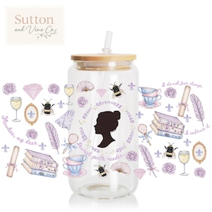 May include: A clear glass tumbler with a bamboo lid and straw, featuring a black silhouette of a person in a floral wreath with the text Dearest gentle reader, surrounded by illustrations of bees, roses, books, feathers, and wine glasses.