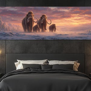 May include: A panoramic canvas print depicts a family of woolly mammoths traversing a snowy landscape under a vibrant sunset. The artwork features detailed depictions of the animals and a warm color palette of oranges, pinks, and purples.