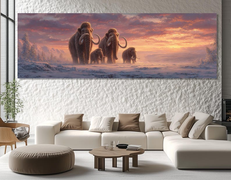 May include: A panoramic canvas print depicts a family of woolly mammoths traversing a snowy landscape under a vibrant sunset. The artwork features detailed textures and warm colors, creating a prehistoric scene.