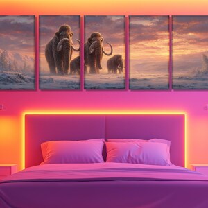 May include: A five-panel canvas art set depicting a herd of woolly mammoths in a snowy landscape under a sunset sky. The artwork is displayed above a bed in a bedroom with pink and orange lighting.