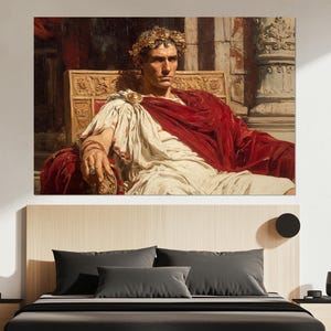 May include: A rectangular wall art print depicting a historical figure wearing a golden laurel wreath and a white toga draped with a deep red mantle. The figure sits on an ornate wooden chair with carved details, set against a classical architectural background.