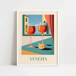 The image is a framed poster depicting two wine glasses filled with orange wine, with a slice of orange on the table, set against a colorful background.