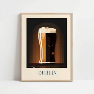 The image is a framed poster depicting a glass of beer with a dark background, likely representing the city of Dublin.