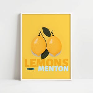 The image is a framed poster with a yellow background and two lemons. The text "LEMONS FROM MENTON" is displayed prominently in the center of the poster.