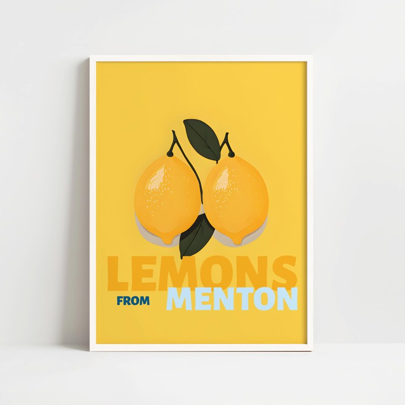 The image is a framed poster with a yellow background and two lemons. The text "LEMONS FROM MENTON" is displayed prominently in the center of the poster.