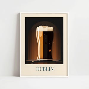 The image is a framed poster depicting a glass of beer with a dark background, likely representing the city of Dublin.