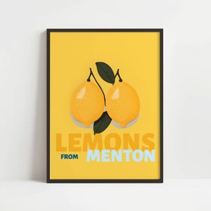 The image is a framed poster with a yellow background and two lemons. The text "LEMONS FROM MENTON" is displayed prominently in the center of the poster.