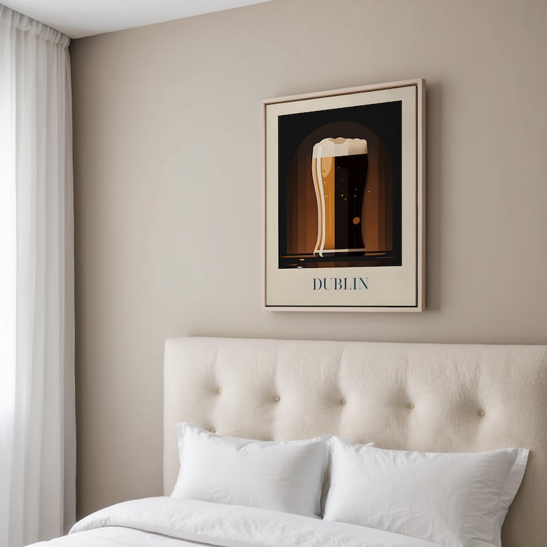 May include: A framed print of a glass of beer with a white head, set against a dark background. The text "DUBLIN" is printed below the glass.