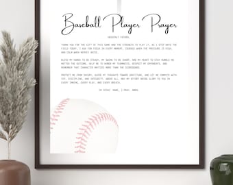 May include: Framed print with the "Baseball Player Prayer" in script, and a baseball graphic. The print includes a cross at the top. The print is in a black frame and is displayed on a shelf.