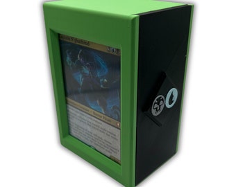 May include: A green and black deck box with a card sleeve featuring the Magic: The Gathering card "Captain N'ghathrod".