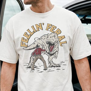 Funny Rodeo Comfort Colors® Shirt, Cowboy Rodeo Tshirt, Feeling Feral Tee, Retro T-rex Shirt, Dinosaur Lover Gift, Western Graphic Tee image 2
